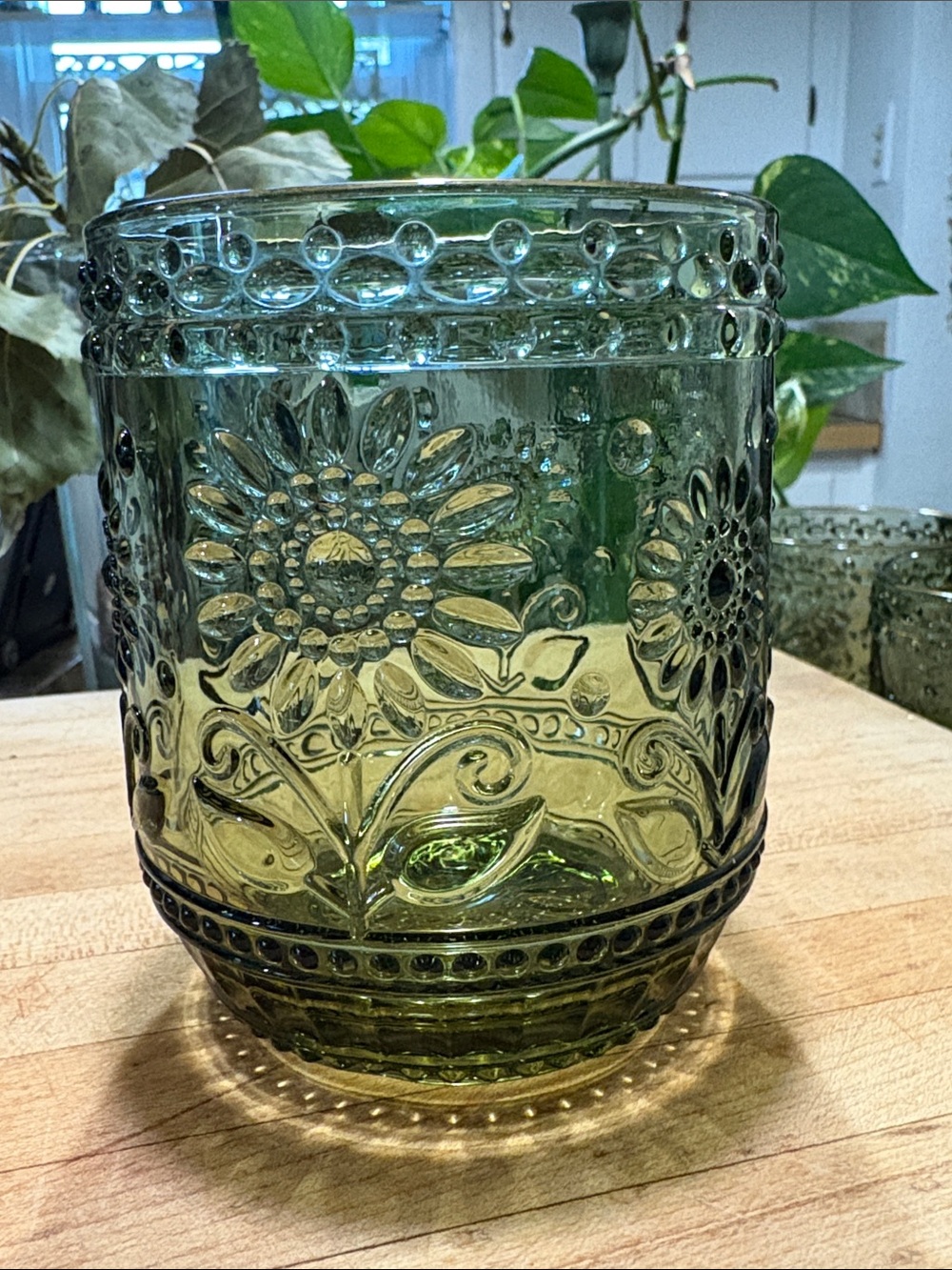 Set of 4. Embossed Green Glass
